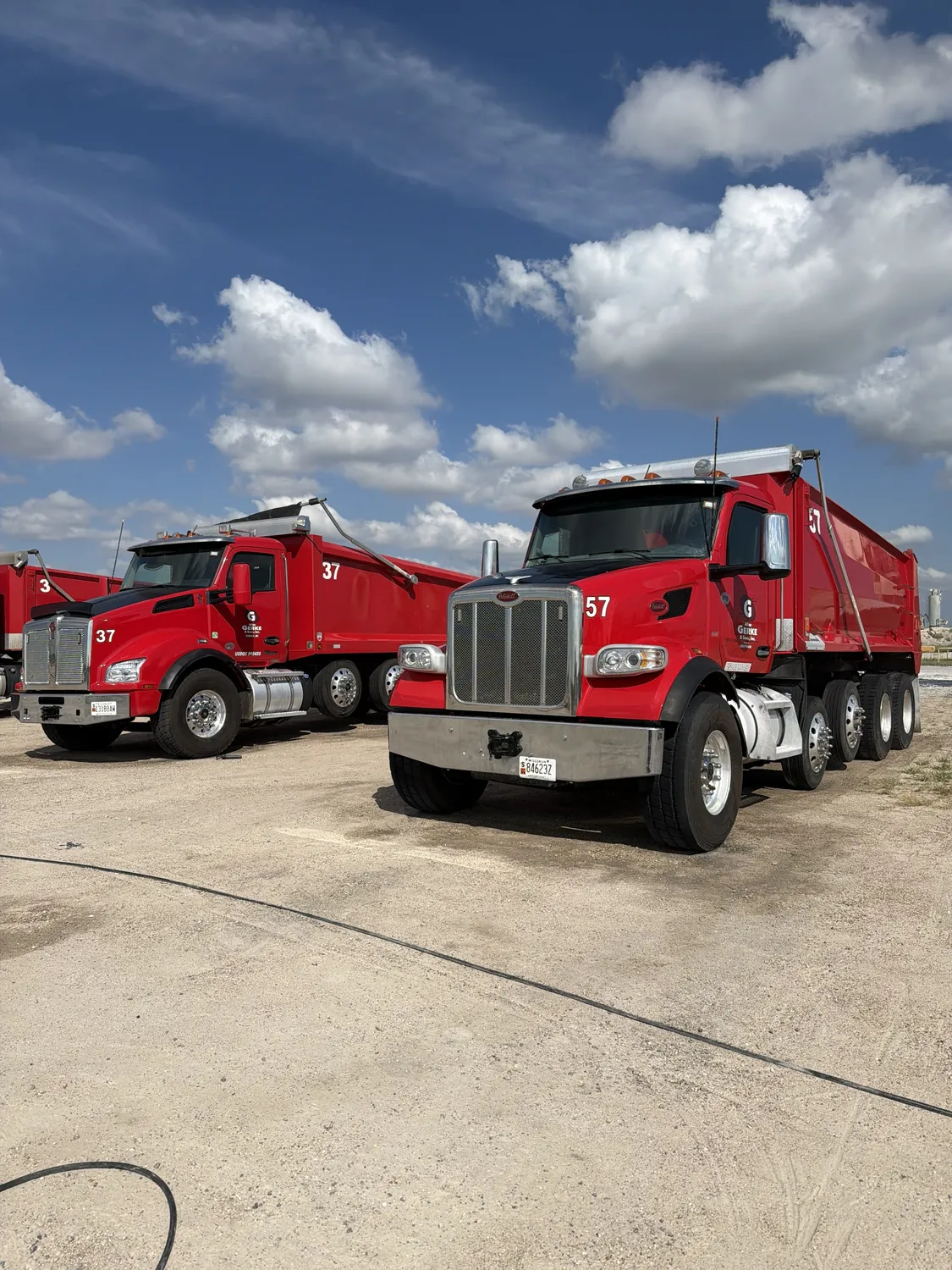 Gerke dump trucks, washed down on site